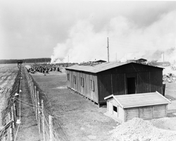 photo of a large warehouse building at a Holocaust era concentration camp