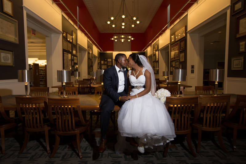 married couple kissing in Special Collections at the Main Library