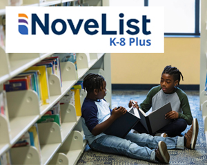 Two African-American kids reading books off the shelf at Jacksonville Public Library