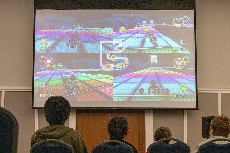 Photo of people playing Mario Kart