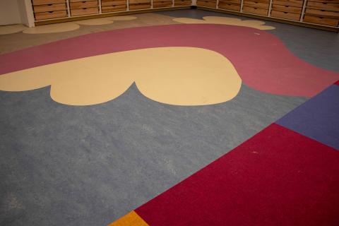Colorful carpeting being installed at Webb Wesconnett Regional Library