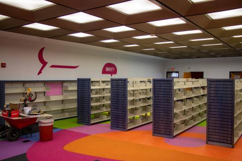 Shelving units and wall text painting