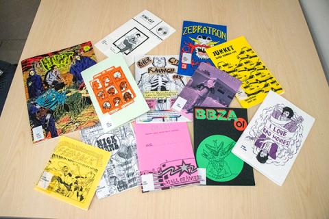 a display of assorted zines