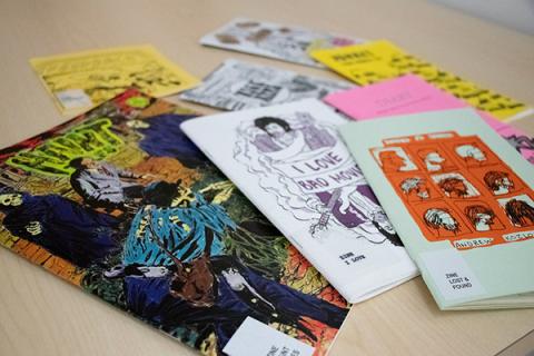 a display of assorted zines