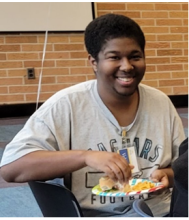young person volunteering at the library