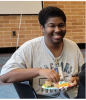 young person volunteering at the library