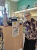 Photo of smiling volunteer at the library.